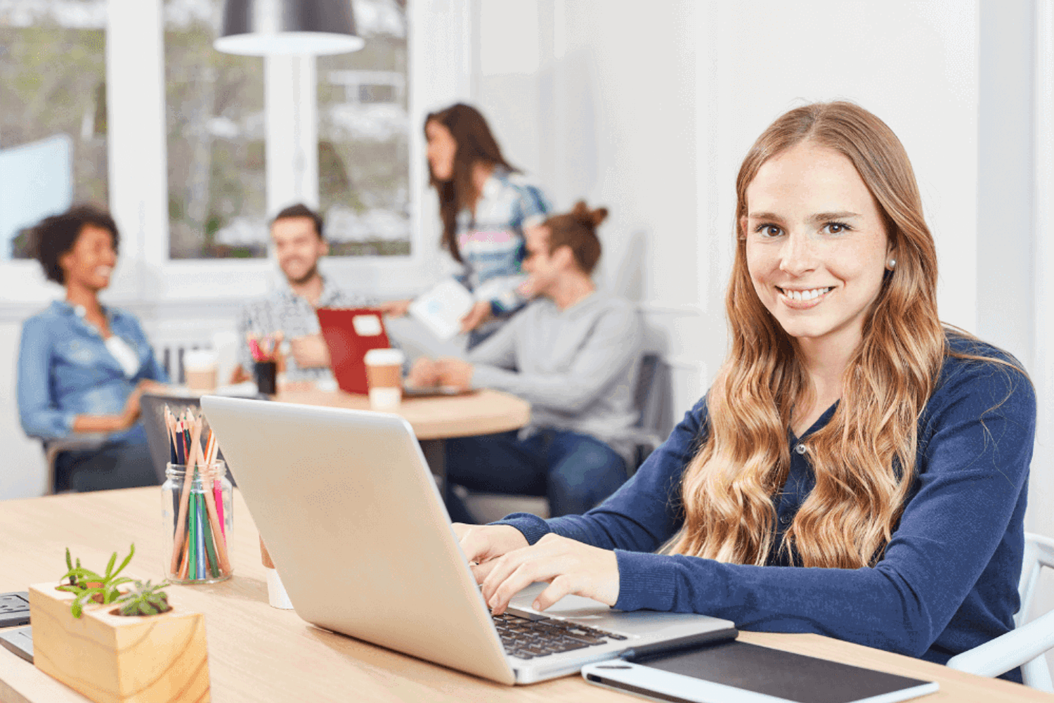 Happy girl in office