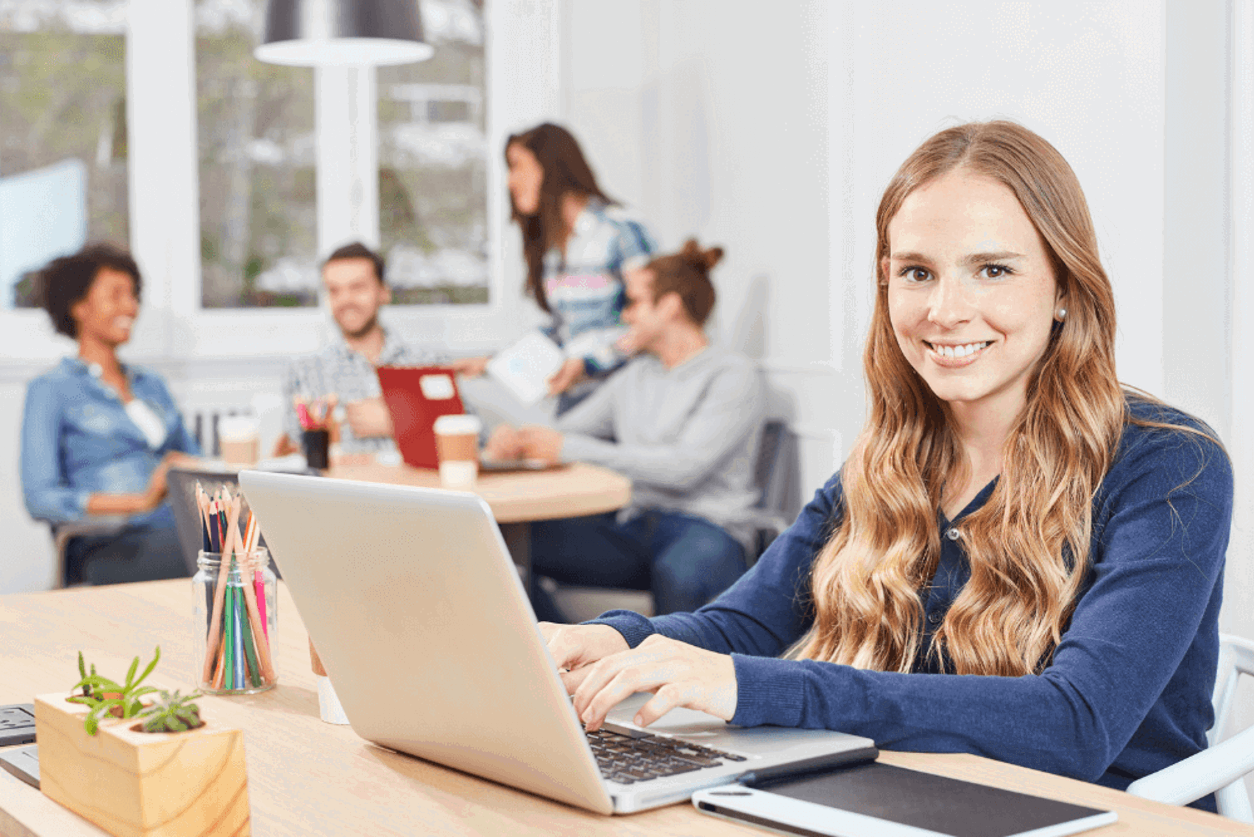 Happy girl in office